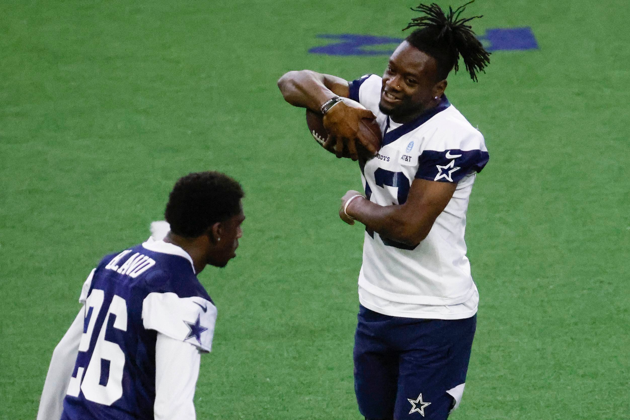 Dallas Cowboys wide receiver Michael Gallup (13) reacts after catching a pass during a mini...