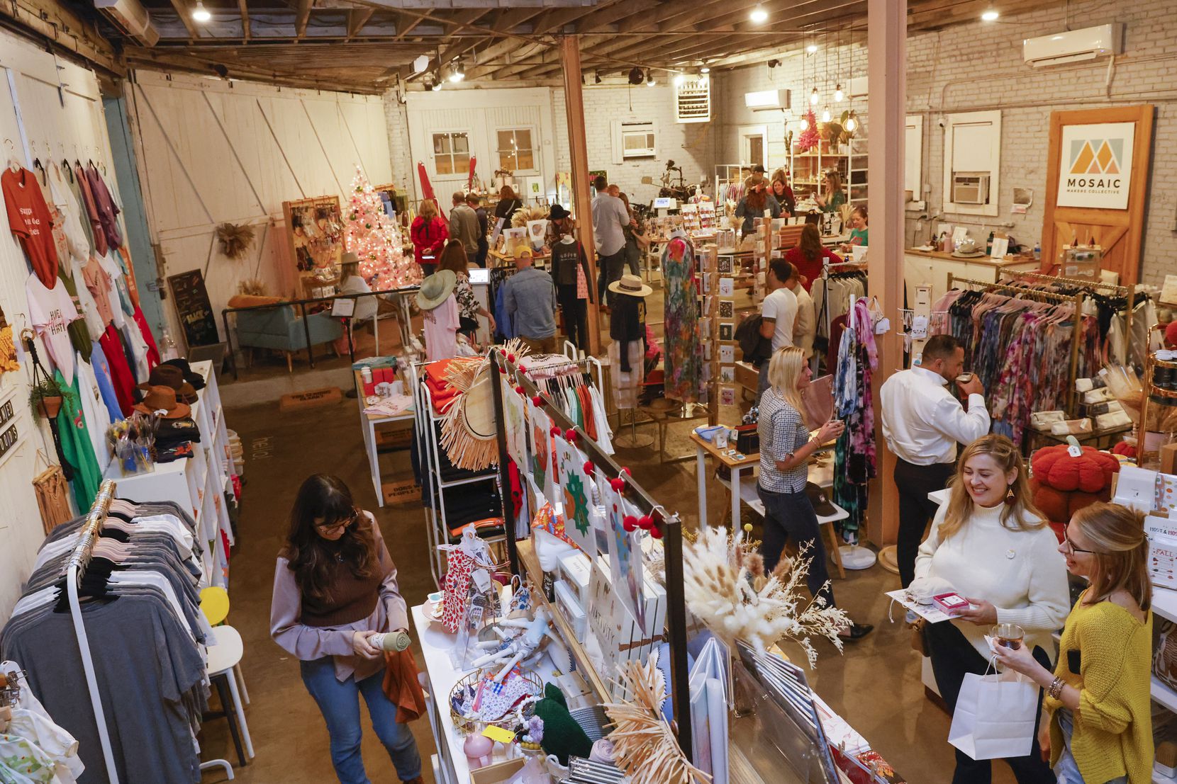 Shoppers at Mosaic Makers Collective in the Bishop Arts District during a holiday open house...