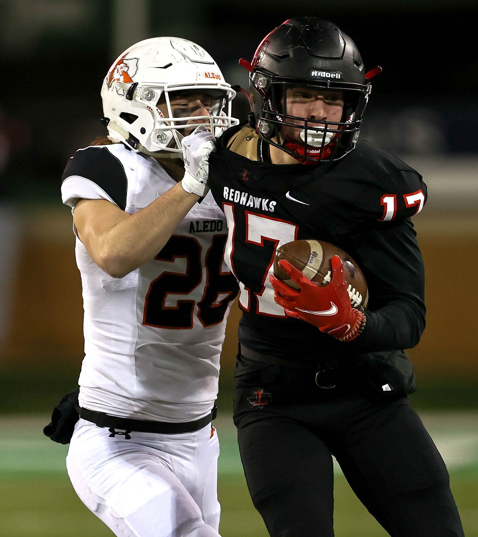 Frisco Liberty wide receiver Lawson Towne (17) is forced out of bounds by Aledo cornerback...