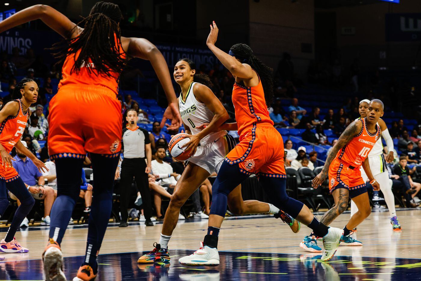 Dallas Wings forward Satou Sabally (0) goes for a shot during the first quarter at the UTA's...