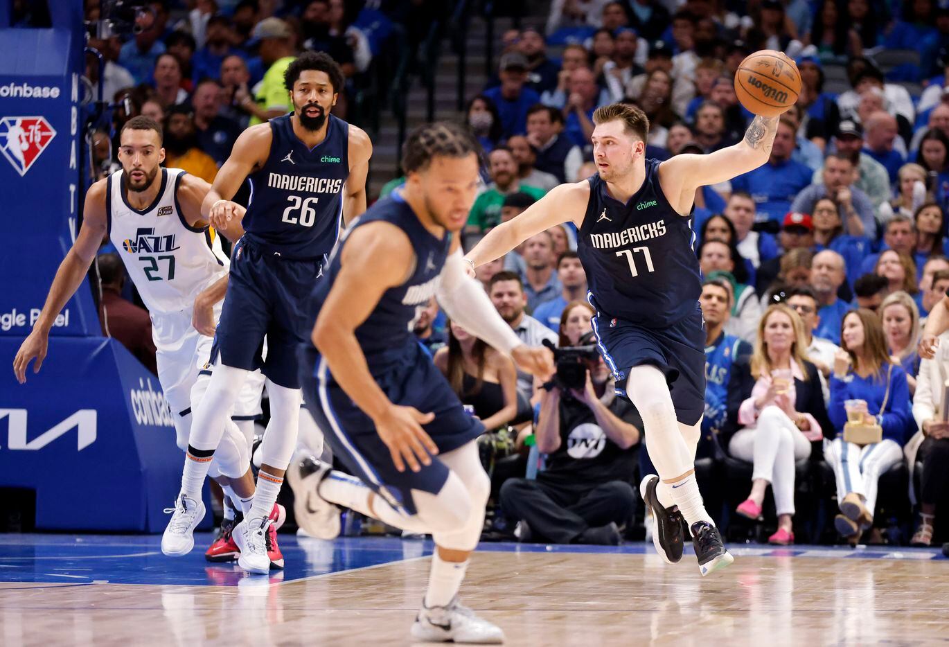 Dallas Mavericks guard Luka Doncic (77) brings the ball up court after a missed Utah Jazz...