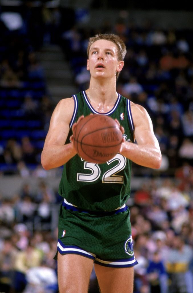Detlef Schrempf #32 of the Dallas Mavericks shoots a free throw during an NBA game against...