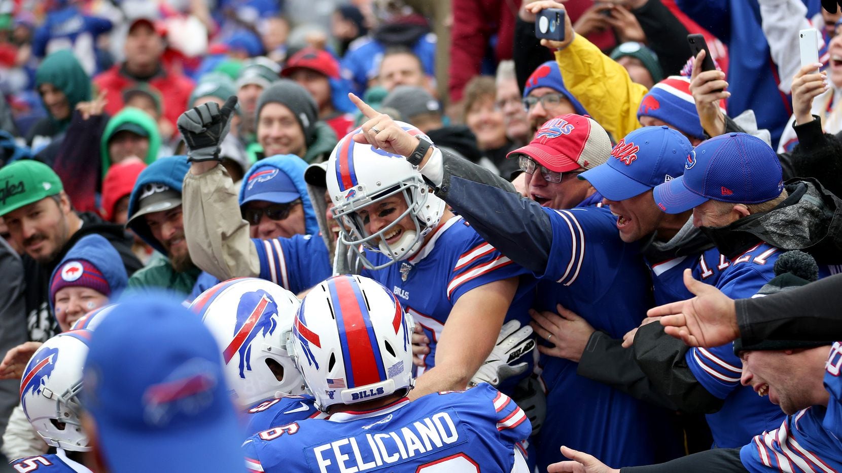 ORCHARD PARK, NEW YORK - OCTOBER 27: Cole Beasley #10 of the Buffalo Bills celebrates after...