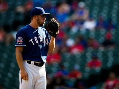 FILE - Rangers relief pitcher Adrian Sampson (52) is pictured during the ninth inning of a game against the Seattle Mariners on Sunday, Sept. 1, 2019, at Globe Life Park in Arlington.