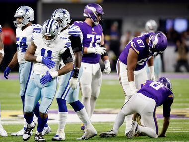 Dallas Cowboys linebacker Micah Parsons (11) rubs his belly after sacking Minnesota Vikings...