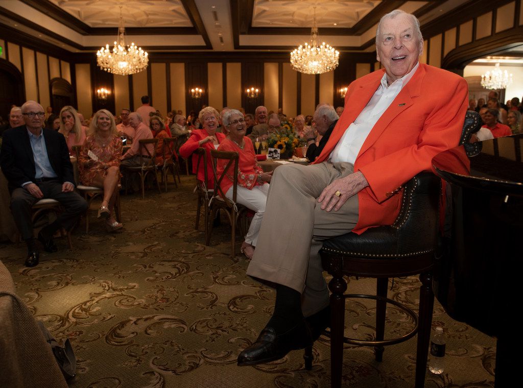 T. Boone Pickens watches one of the three dozen video tributes.