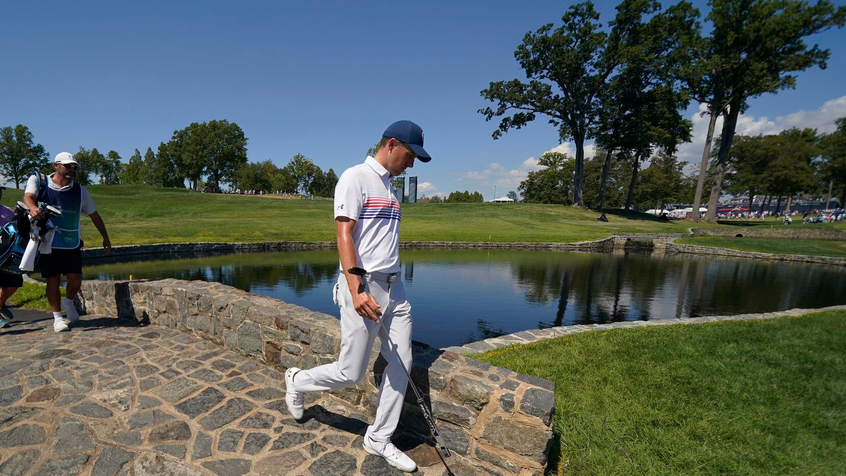 Jordan Spieth walks to the fifth green during the third round of the BMW Championship golf...