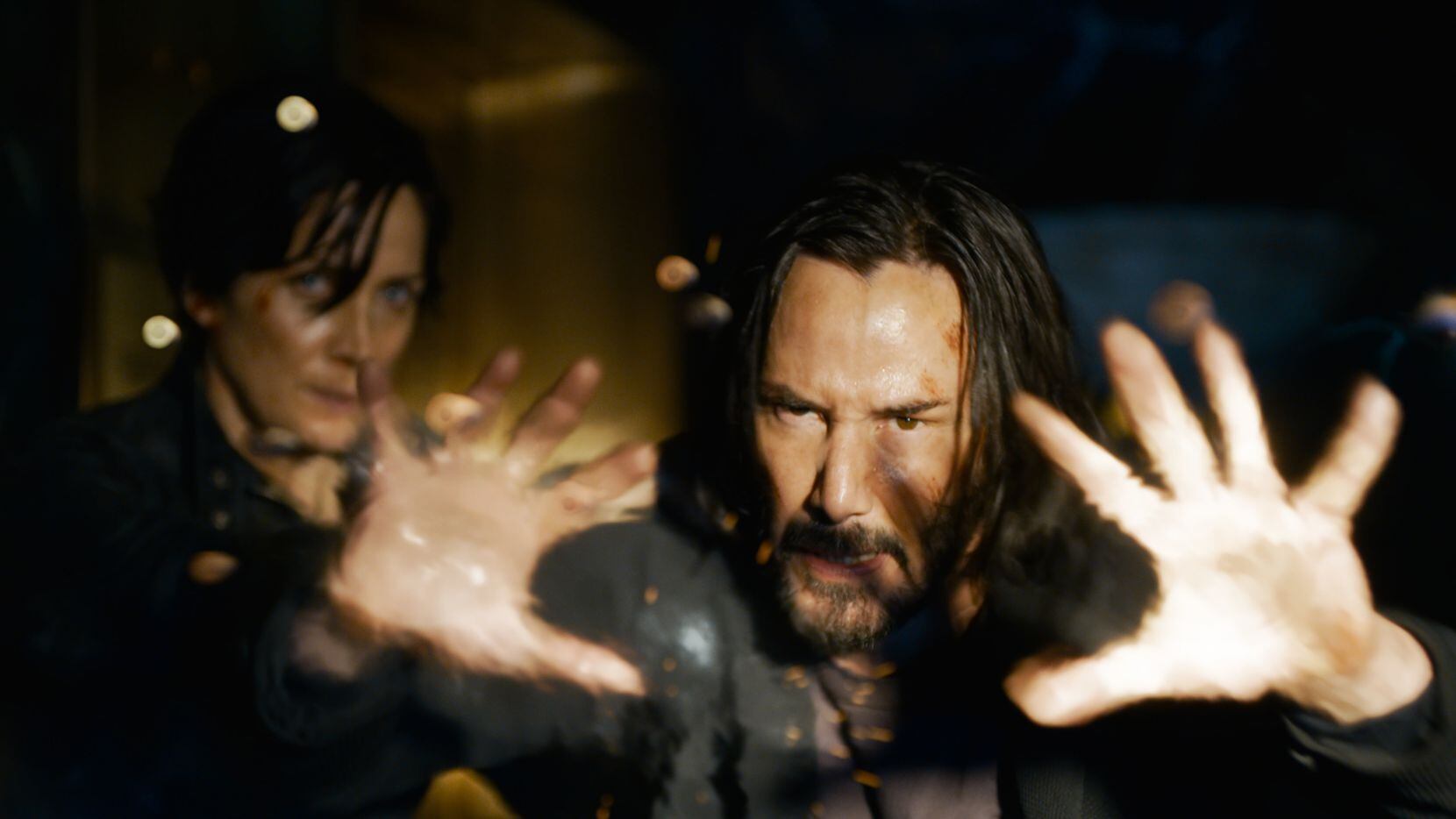 Keanu Reeves and Carrie-Anne Moss star in "The Matrix Resurrections."