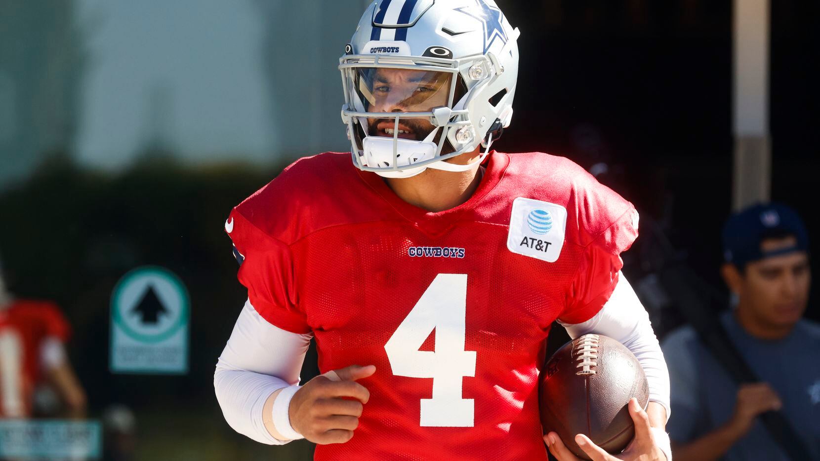 Dallas Cowboys quarterback Dak Prescott (4) enters the field during a team practice ahead of...