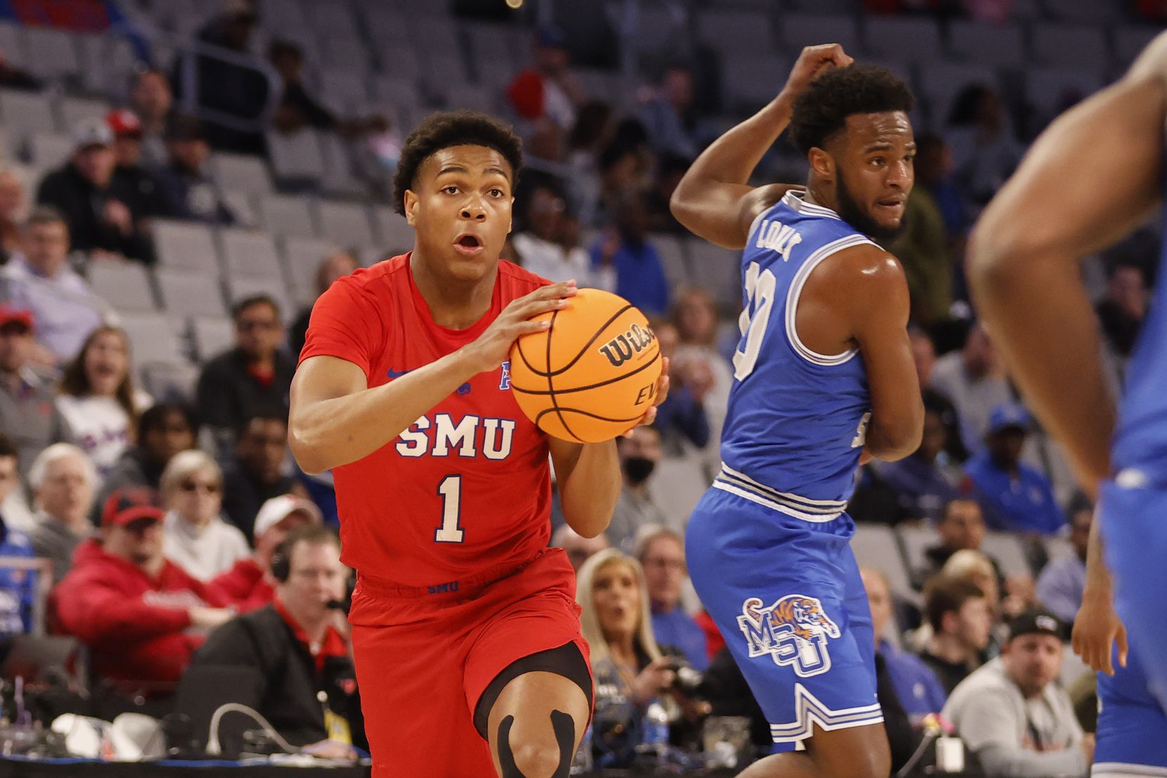 SMU guard Zhuric Phelps (1) steals the ball on a pass to Memphis guard Alex Lomax (10)...