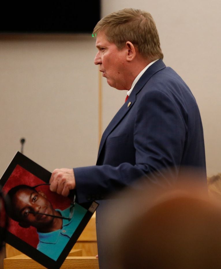 Lead prosecutor Michael Snipes delivered an opening statement Thursday during Roy Oliver's...
