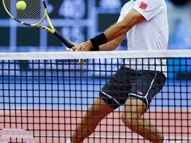 Jean-Julien Rojer returns the ball  during the doubles final of the ATP Dallas Open against...