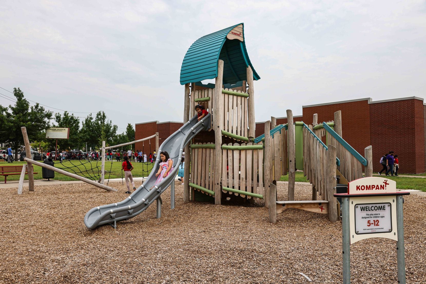 A portion of the new playground equipment installed at Guzick Elementary in Dallas, one of...