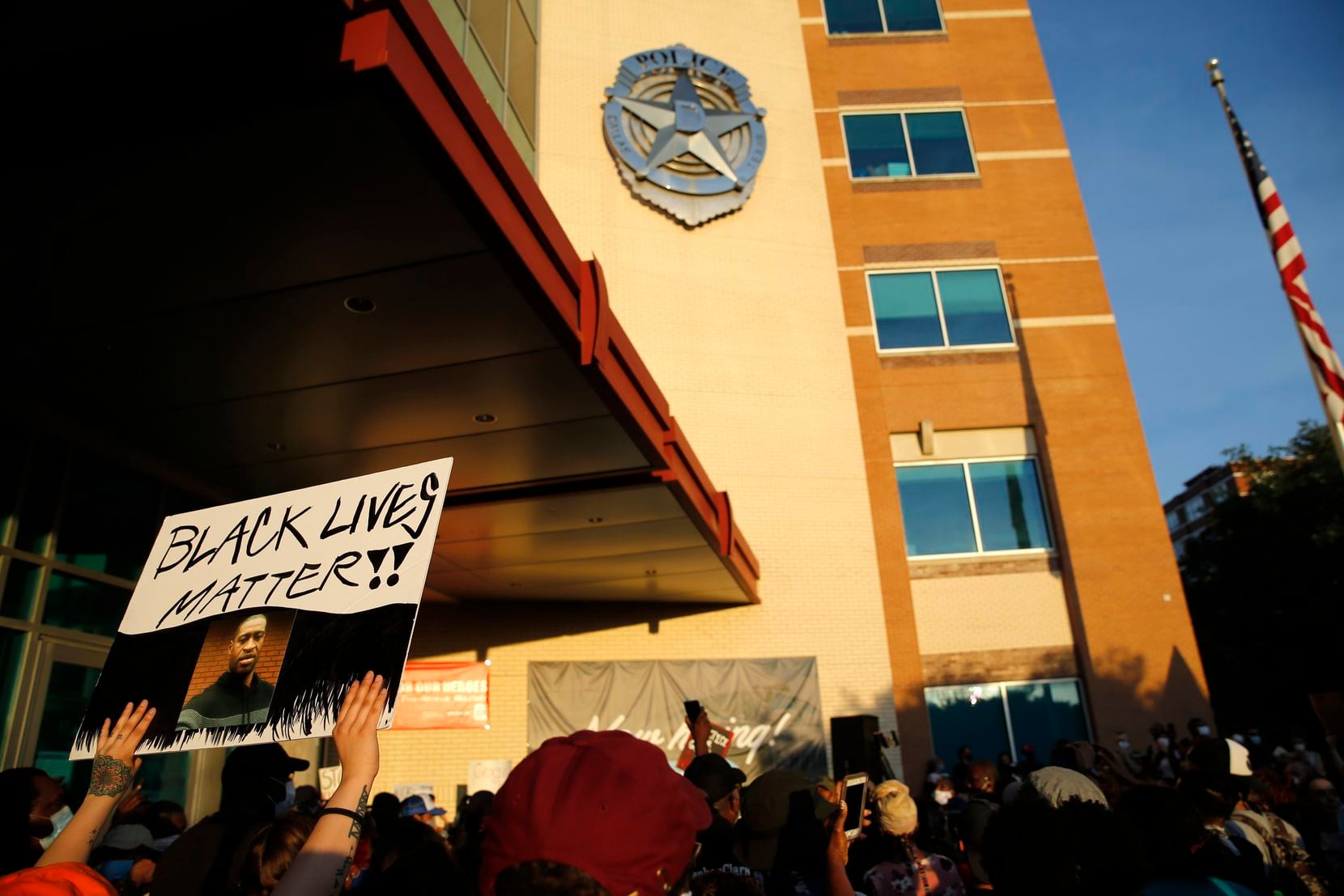 Protesters rally during a demonstration against police brutality in front of Dallas Police Department headquarters in downtown Dallas, on Friday, May 29, 2020. Despite calls from some to defund the police, the new city budget does not call for any major reductions in police funding, aside from $7 million in overtime.