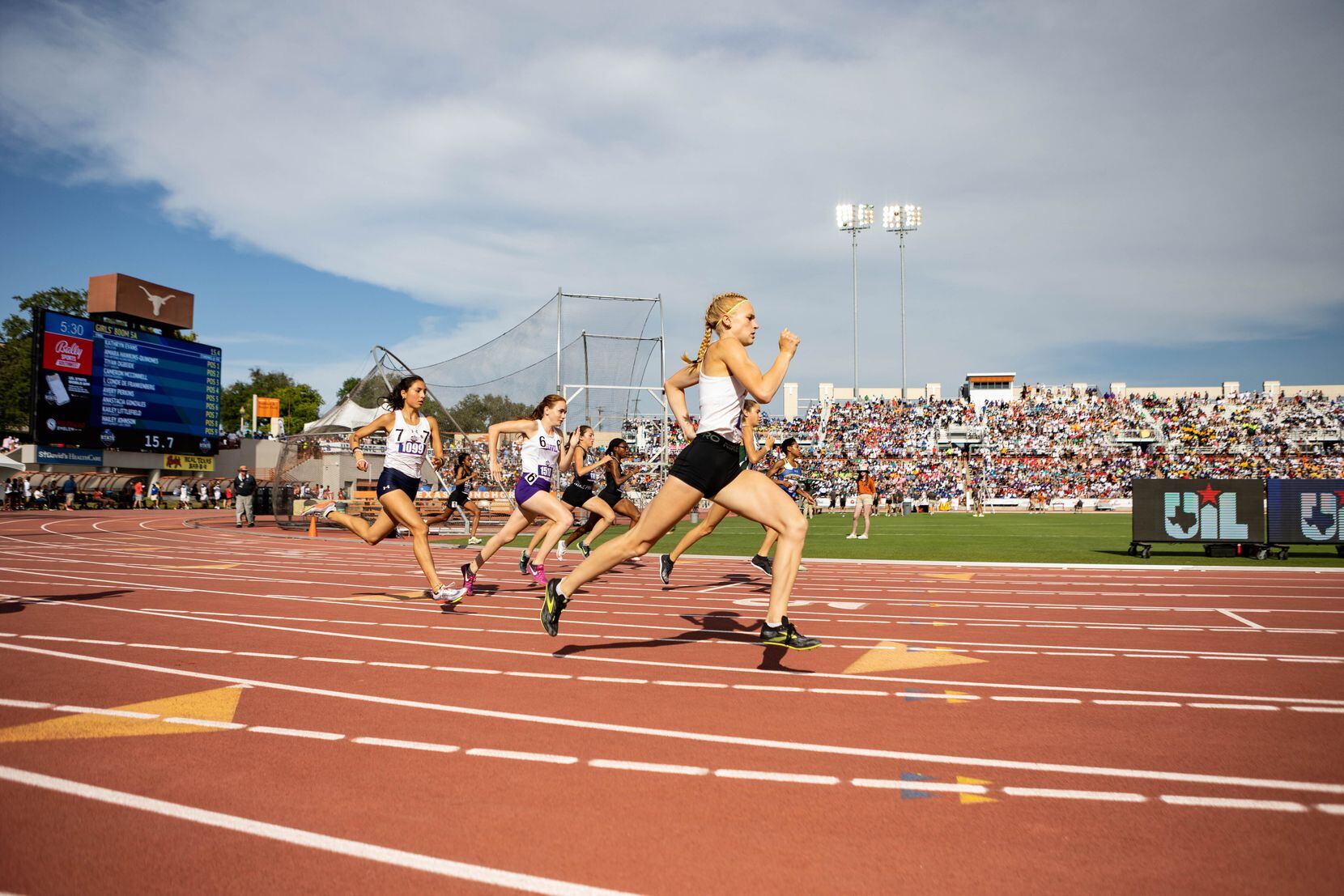 Kailey Littlefield of Lucas Lovejoy takes an early lead in the girls’ 800m race at the UIL...