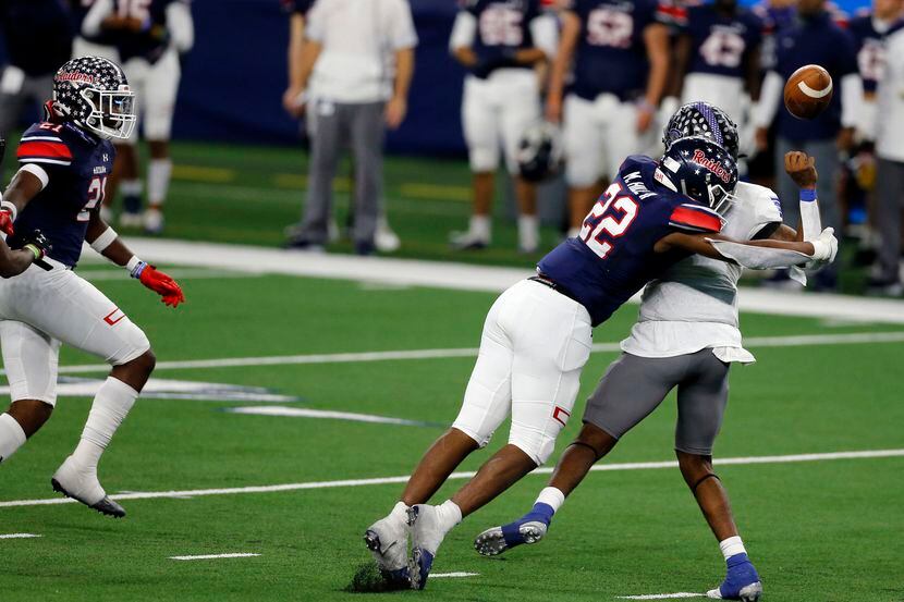 Denton Ryan defender MarQuice Hill Jr. (22) forces a fumble from Mansfield Summit Qb David...