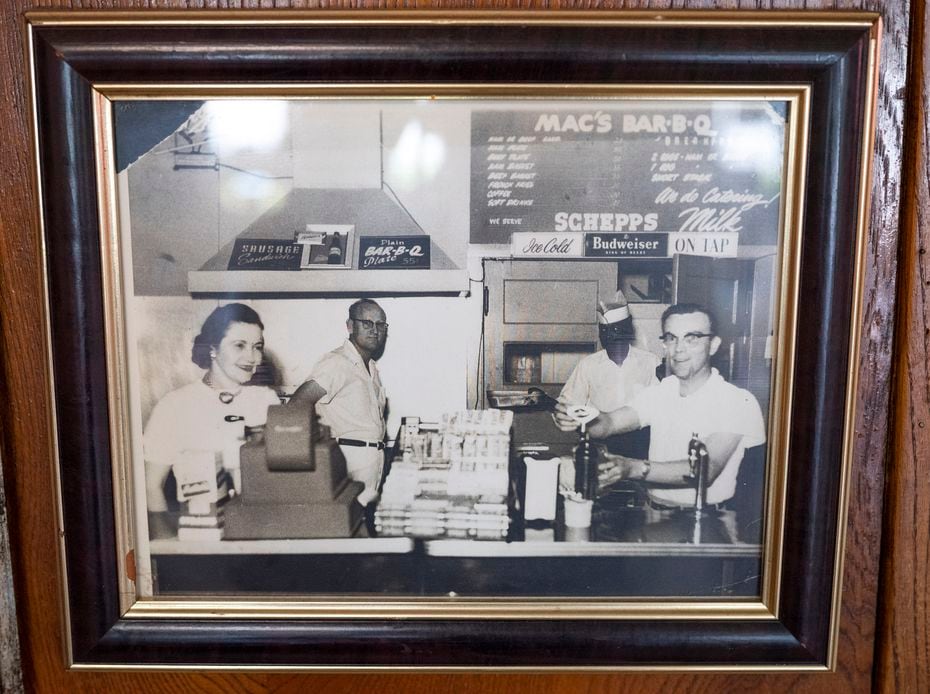 The original owner of Mac's Bar-B-Que, Bill McDonald, second from left, opened the restaurant in 1955 at 3600 Main St., about 0.2 miles away from its final spot at 3933 Main St.