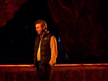 Director Tomer Zvulun walks on stage during staging rehearsal for Dallas Opera’s Das...