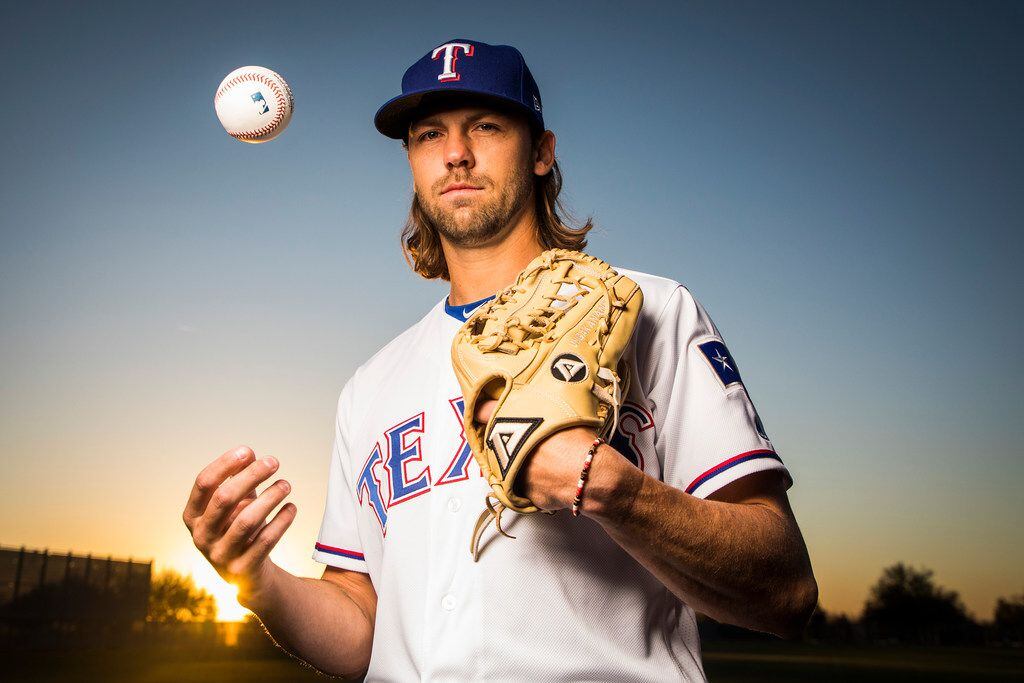 Texas Rangers pitcher Tayler Scott  poses for a photo during Spring Training picture day at...