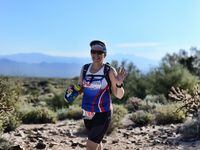 Carol Hughes runs a race in Arizona. The Arlington ISD librarian recently completed her 50th marathon.