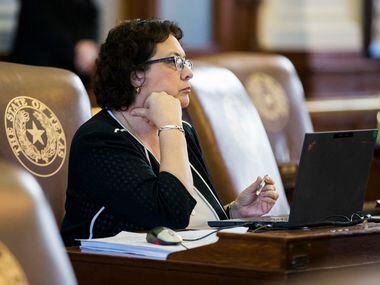 State Rep. Celia Israel, D-Austin, listens at her desk on the second day of the 86th Texas...