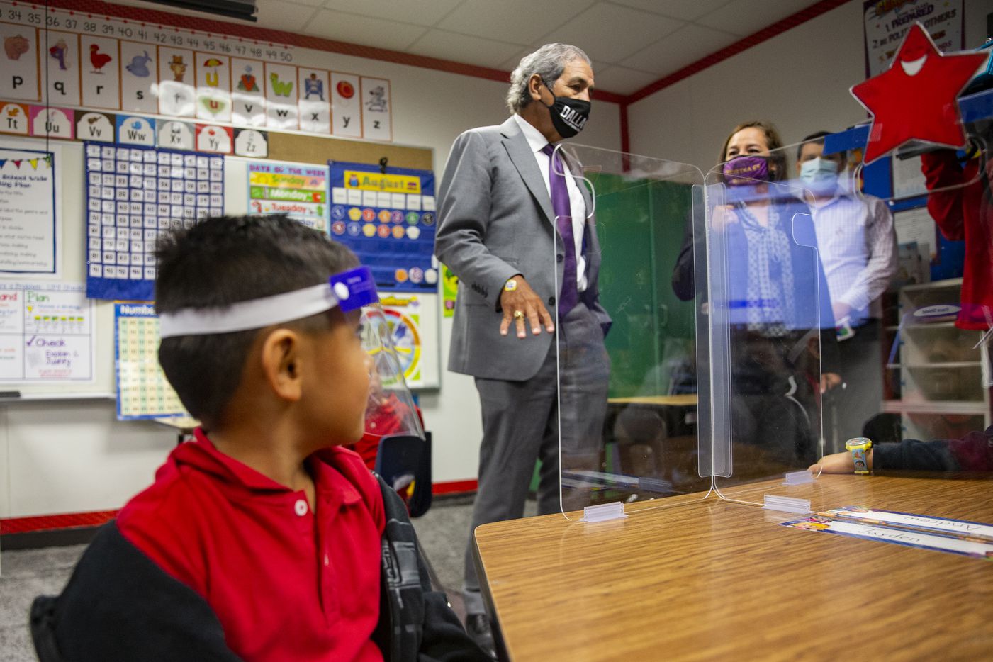 DISD superintendent Michael Hinojosa welcomes students in Ms. Ruiz's kindergarten as they attend in-person classes during their second "first day of school" at Winnetka Elementary School in Dallas Monday, Sept. 28, 2020 . (Juan Figueroa/ The Dallas Morning News)