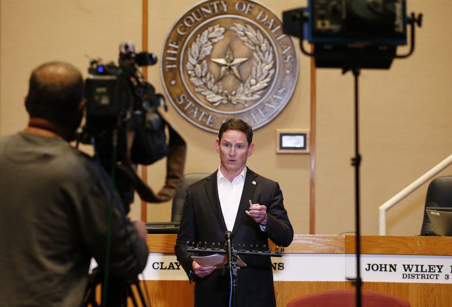 Dallas County Judge Clay Jenkins speaks at a press conference updating an amended order for...