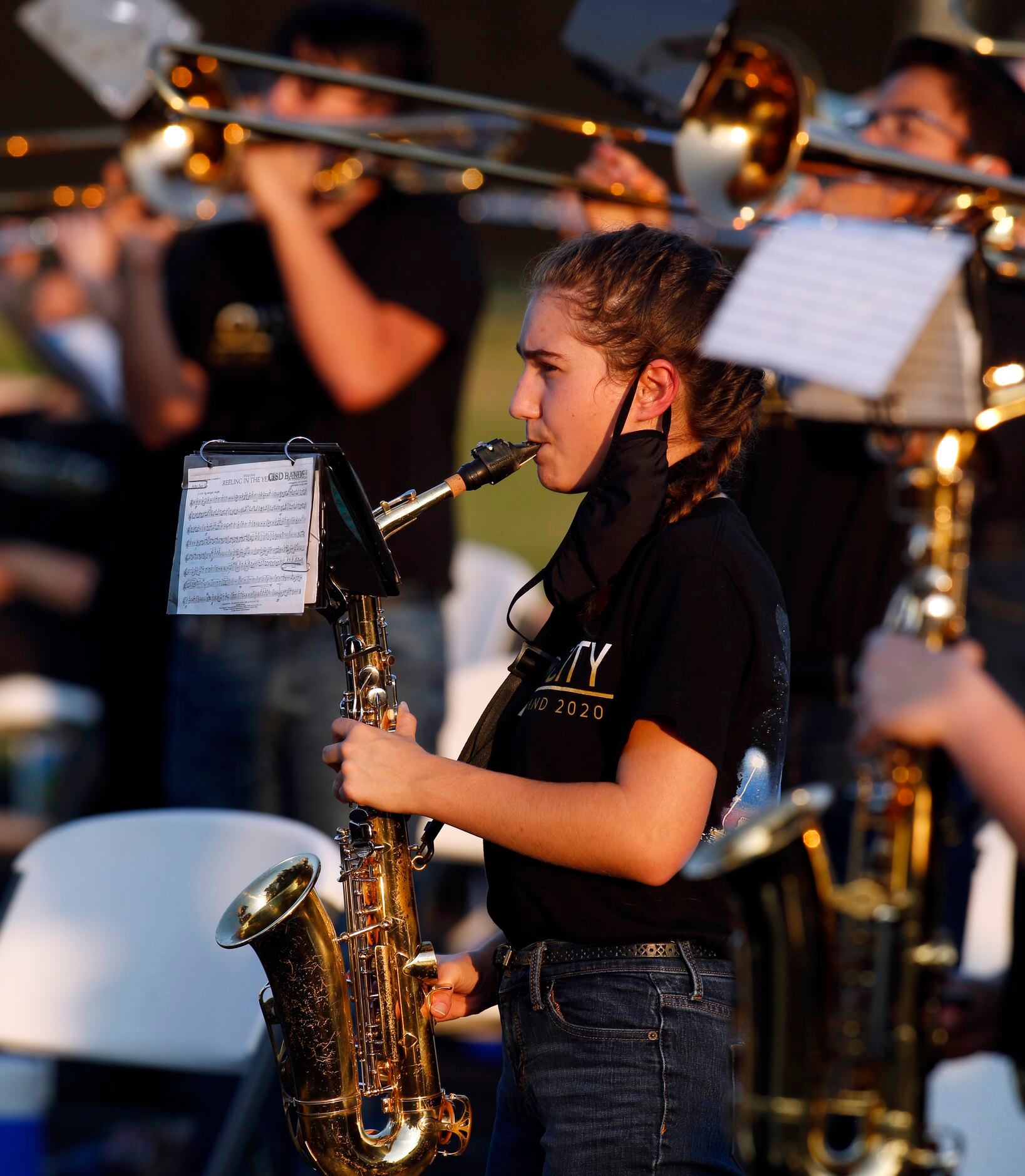 Anna Palmer, junior saxophone player in the Royse City High School band, goes through...