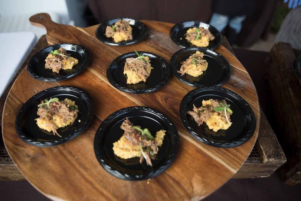 Sharon Van Meter made smoked whole hog leg with loaded grits during Chefs for Farmers at Oak...