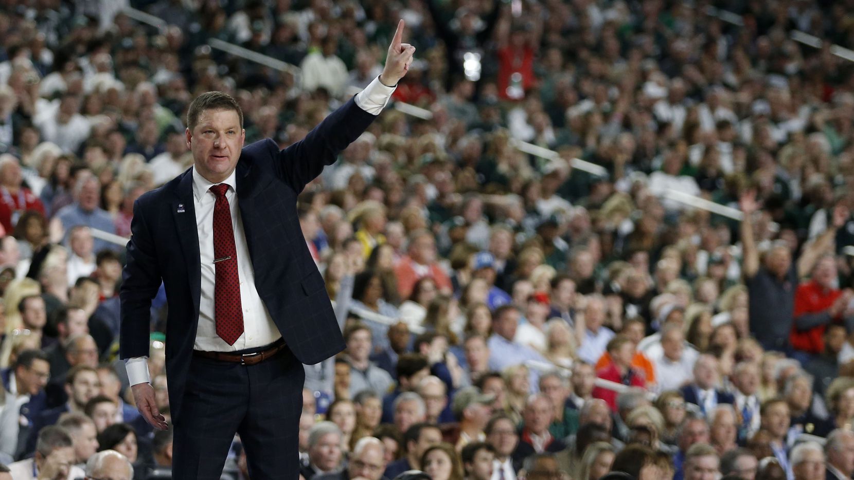Texas Tech Red Raiders head coach Chris Beard communicates to his players in a game against the Michigan State Spartans during the second half of play in the semifinals of the Final Four NCAA college basketball tournament at U.S. Bank Stadium in Minneapolis on Saturday, April 6, 2019. Texas Tech Red Raiders defeated the Michigan State Spartans 61-51.