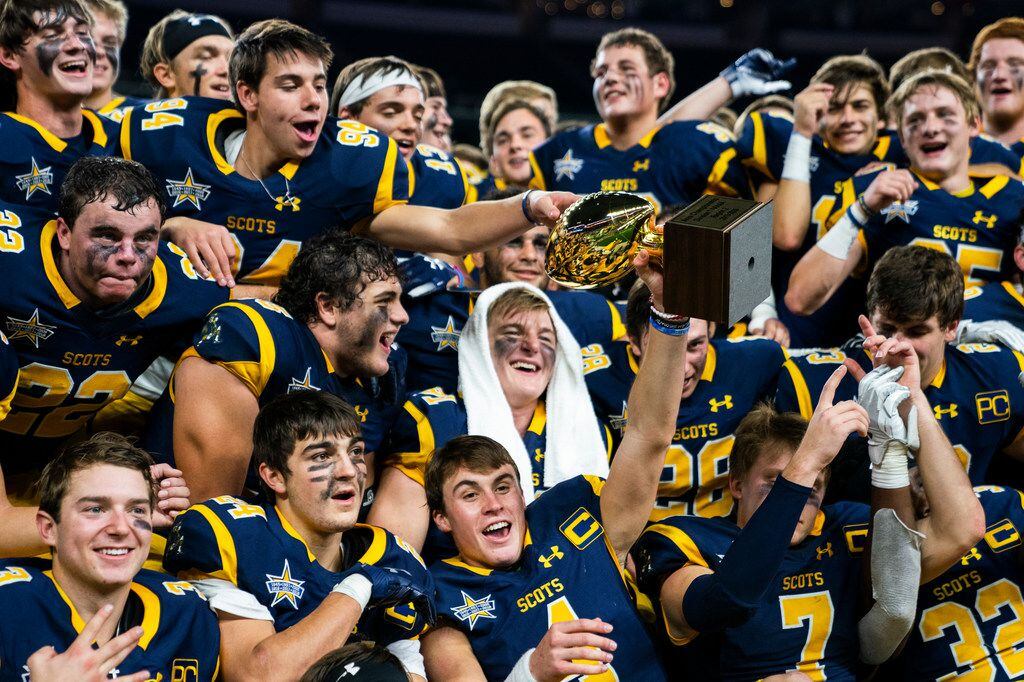 Highland Park football players celebrate a 63-28 win over Magnolia in a Class 5A Division I...