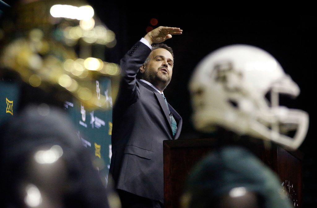 After being introduced, Baylor University's new head football coach Matt Rhule speaks to the...