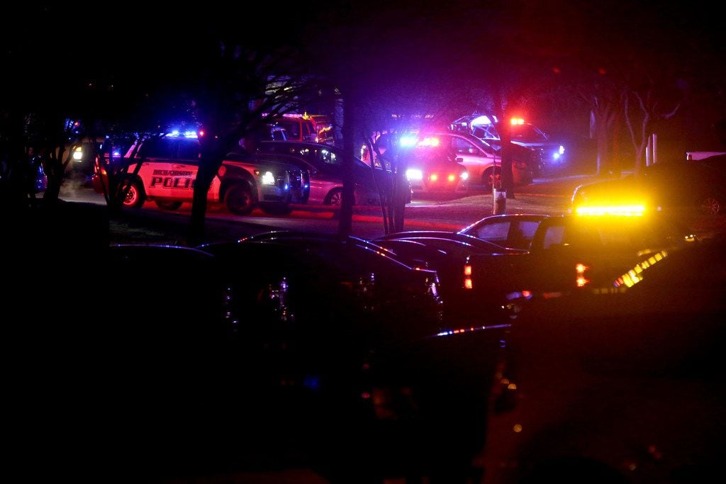 Richardson police investigate where an officer was shot in Richardson, Texas on Wednesday,...
