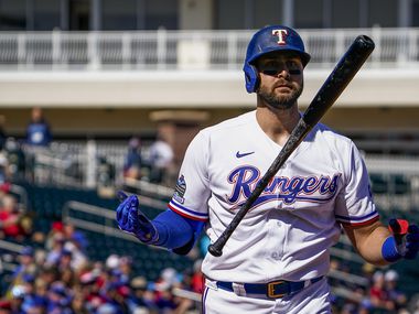 Texas Rangers outfielder Joey Gallo reacts after striking out during the first inning of a spring training game against the Kansas City Royals at Surprise Stadium on Tuesday, Feb. 25, 2020, in Surprise, Ariz. 