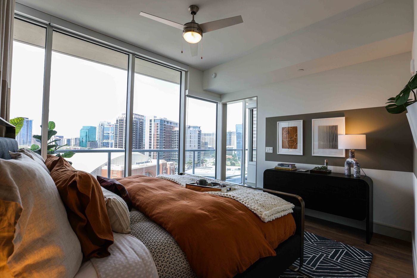Main bedroom in a 2 beds 2 bath apartment at The Victor in Dallas. (Lola Gomez / The Dallas Morning News)