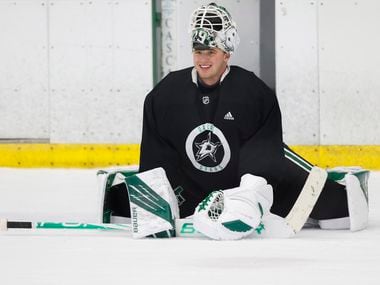 Dallas Stars goaltender Jake Oettinger stretches during a training camp practice at the Comerica Center on Wednesday, Jan. 6, 2021, in Frisco.