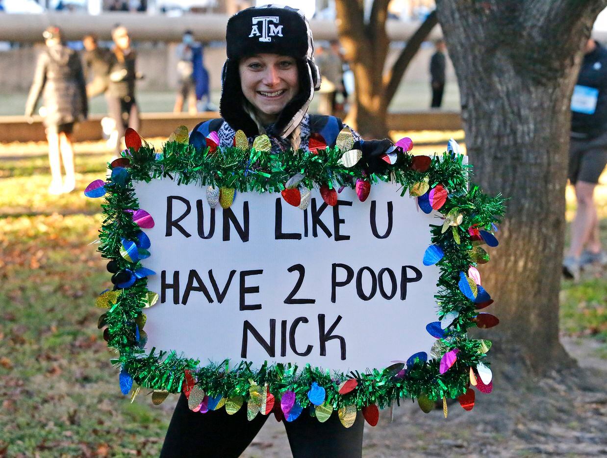 Emily Ehringer of Grapevine, holds a sign to support her husband Nick who was running as the...