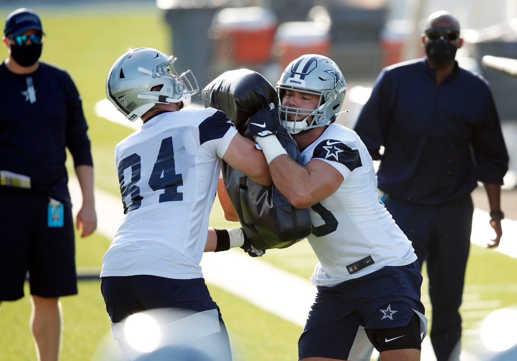 Dallas Cowboys tight end Blake Bell (80) attempts to run through Dallas Cowboys tight end...