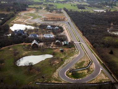 The site of the Toyota executive retreat in Denton County includes a racetrack and buildings...