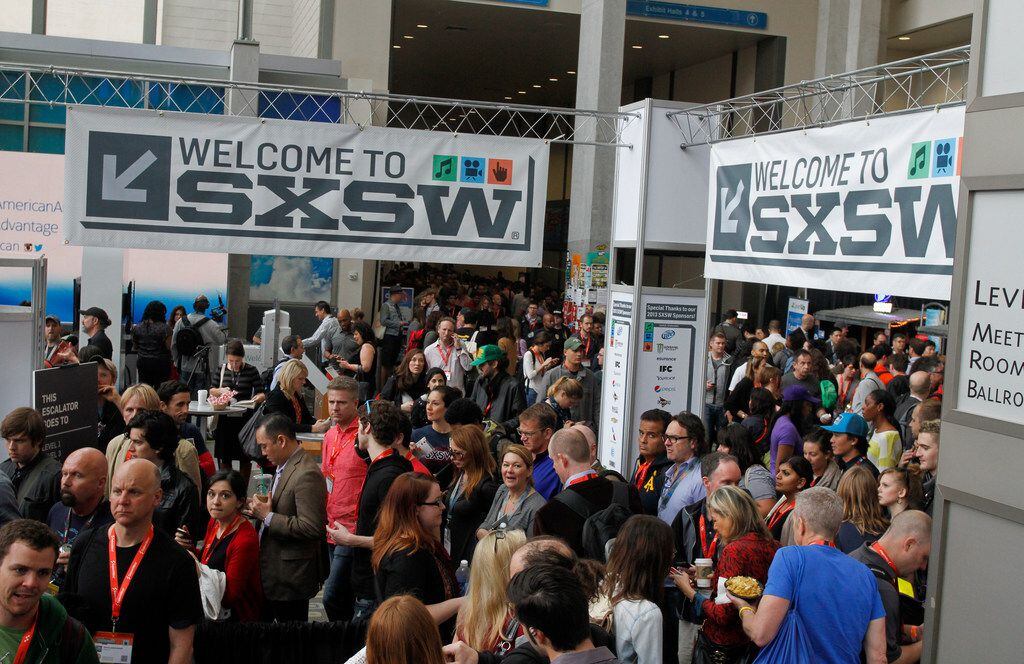 FILE - In this March 9, 2013, file photo, SXSW Interactive and Film Festival attendees crowd...