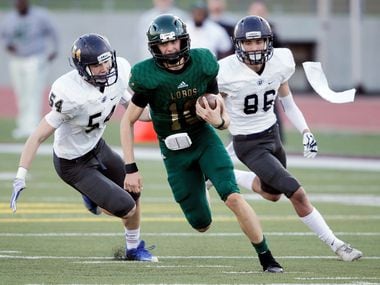 TXHSFB Longview sophomore quarterback Haynes King (10) evades Jesuit junior Collin Kenny (54) and sophomore defensive back Christian Allocco (86) during the first half of a high school Class 6A Division II play-off football game at John Kincaide Stadium, Saturday, November 25, 2017.