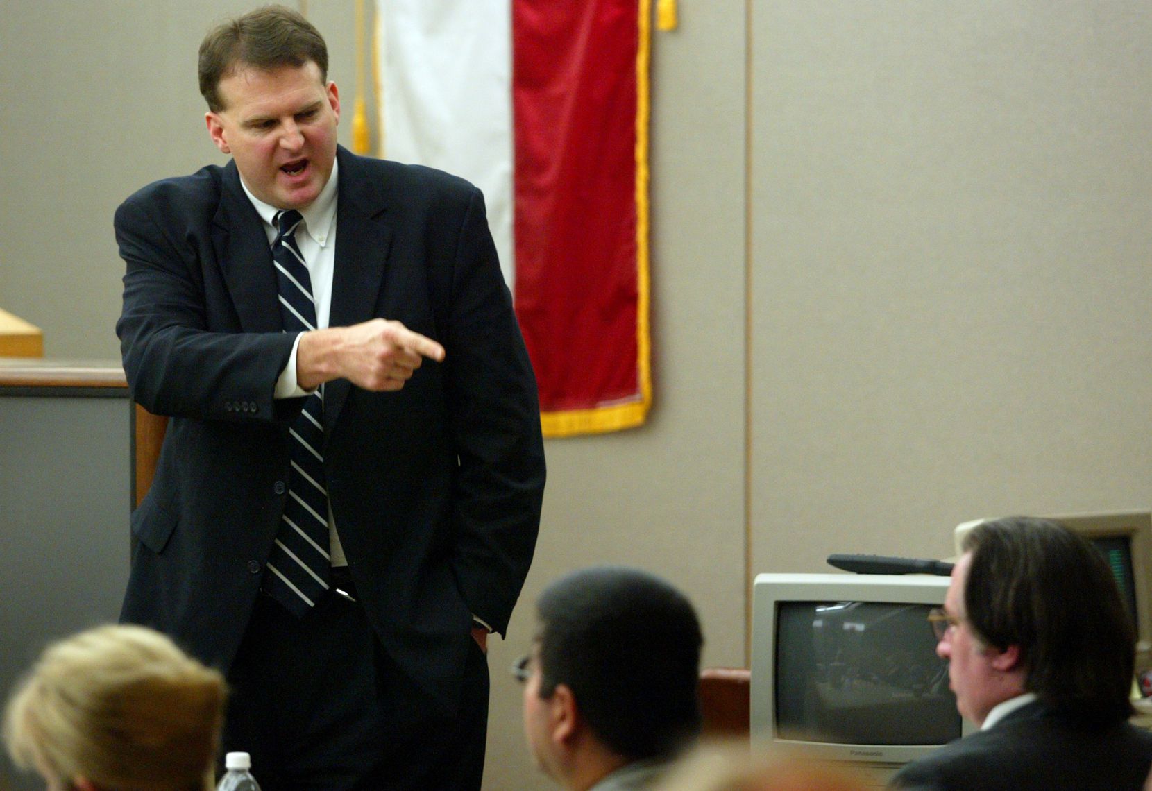 Then-Dallas County prosecutor Bill Wirskye points to Patrick Murphy during the sentencing ...