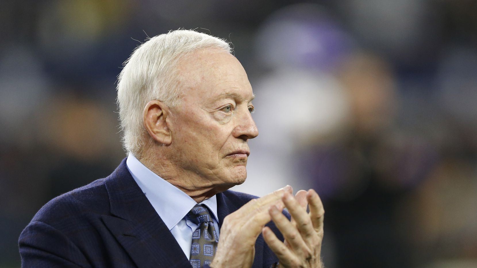 FILE - Cowboys owner Jerry Jones claps as the team takes the field for warmups before a game against the Minnesota Vikings in Arlington on Sunday, Nov. 10, 2019.