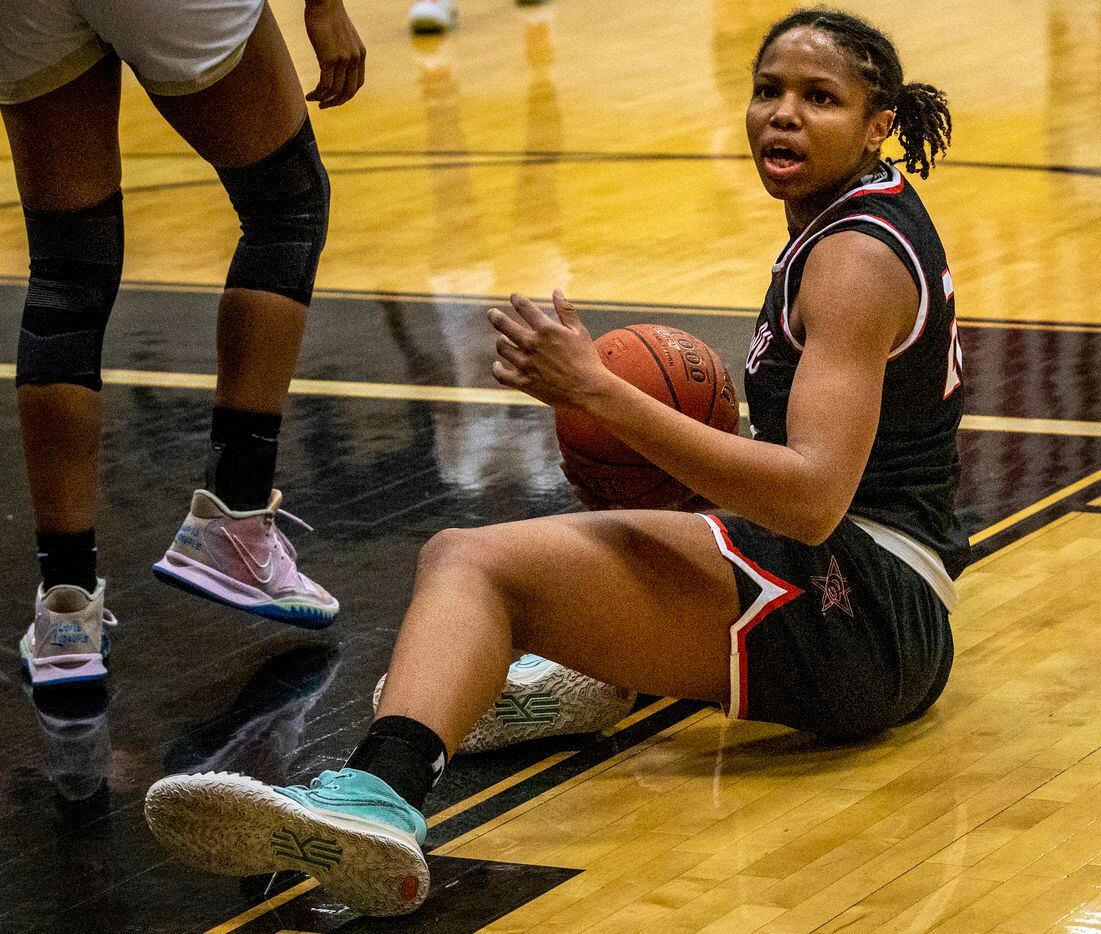 Coppell High School India Howard (22) reacts to a call from the referee in the first quarter...