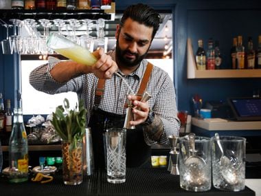 Former RM 12:20 bartender Ravinder Singh mixes a sparkling rosemary and sage mocktail. Mocktails are all the rage in Dallas-Fort Worth right now.