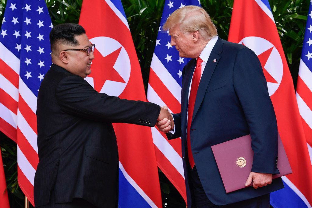 North Korea leader Kim Jong Un and U.S. President Donald Trump shake hands at the conclusion...