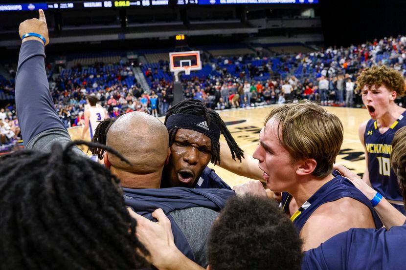 McKinney guard Alex Anamekwe (center) is swarmed by teammates after a game-winner in double...