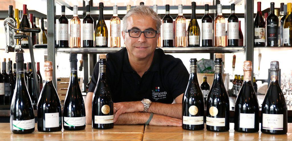 
Daniele Puleo, chef-owner of CiboDivino Marketplace in Dallas, with a variety of Lambrusco...