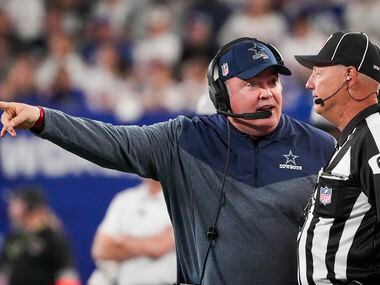 Dallas Cowboys head coach Mike McCarthy argues for a call with down judge Tom Stephan during...