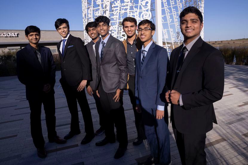 Coppell High School seniors and Charitable Investment Club members (from left) Anshul Shah,...